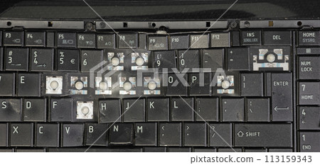Old broken laptop isolated on white background Old broken laptop isolated on white background 113159343