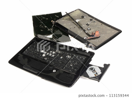Old broken laptop isolated on white background Old broken laptop isolated on white background 113159344
