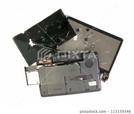 Old broken laptop isolated on white background 113159346