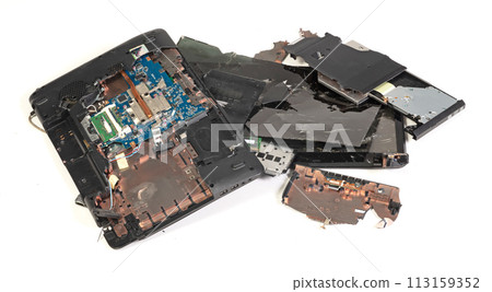 Old broken laptop isolated on white background 113159352