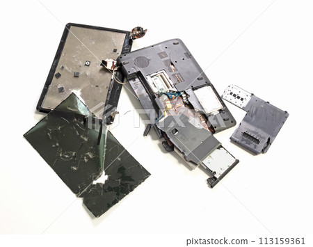 Old broken laptop isolated on white background Old broken laptop isolated on white background 113159361