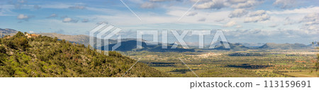 Panoramic View of San Salvador Peak and Tramuntana Range in Mallorca Panoramic View of San Salvador Peak and Tramuntana Range in Mallorca 113159691