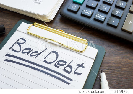 Bad debt concept. Financial report, calculator and note paper. Bad debt concept. Financial report, calculator and note paper. 113159793