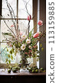 Beautiful bouquet of flowers in vase. Floral arrangement 113159885