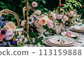 Table setting with rose flowers and candles for an event party or wedding reception in summer garden. 113159888