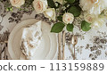 Table setting with rose flowers and candles for an event party or wedding reception in summer garden. 113159889