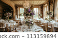 Wedding table decoration with lavender flowers, sweets and cake 113159894