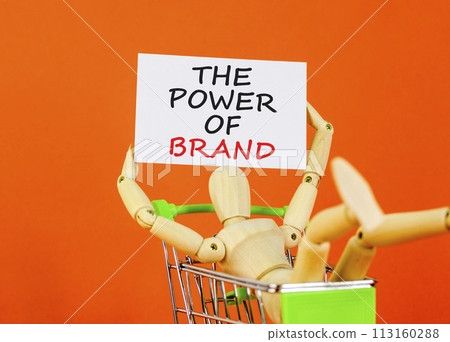 The power of brand symbol. Concept words The power of brand on beautiful white paper. Beautiful orange background. Businessman model. Business the power of brand concept. Copy space. 113160288