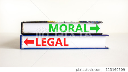 Moral or legal symbol. Concept word Moral or Legal on beautiful books. Beautiful white table white background. Business and moral or legal concept. Copy space. Moral or legal symbol. Concept word Moral or Legal on beautiful books. Beautiful white table white background. Business and moral or legal concept. Copy space. 113160309