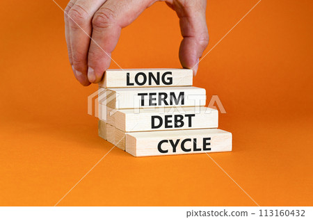 Long term debt cycle symbol. Concept words Long term debt cycle on beautiful wooden block. Beautiful orange table orange background. Businessman hand. Business Long term debt cycle concept. Copy space Long term debt cycle symbol. Concept words Long term debt cycle on beautiful wooden block. Beautiful orange table orange background. Businessman hand. Business Long term debt cycle concept. Copy space 113160432