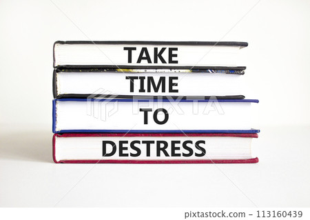 Take time to destress symbol. Concept words Take time to destress on books on a beautiful white table white background. Psychological business and take time to destress concept. Copy space. 113160439