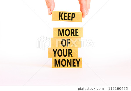 Keep more of your money symbol. Concept words Keep more of your money on wooden block. Beautiful white table white background. Businessman hand. Business keep more of your money concept. Copy space. Keep more of your money symbol. Concept words Keep more of your money on wooden block. Beautiful white table white background. Businessman hand. Business keep more of your money concept. Copy space. 113160455