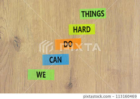 We can do hard things symbol. Concept words We can do hard things on colored paper. Beautiful wooden background. Business, we can do hard things concept. Copy space. We can do hard things symbol. Concept words We can do hard things on colored paper. Beautiful wooden background. Business, we can do hard things concept. Copy space. 113160469
