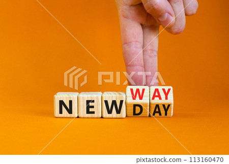 New day and way symbol. Concept word New day New way on beautiful wooden cubes. Beautiful orange table orange background. Businessman hand. Business new day and way concept. Copy space. New day and way symbol. Concept word New day New way on beautiful wooden cubes. Beautiful orange table orange background. Businessman hand. Business new day and way concept. Copy space. 113160470