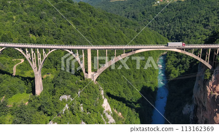 Aerial view on Djurdjevica arch bridge over Tara 113162369