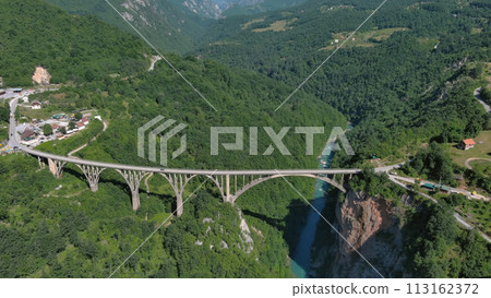 Aerial view on Djurdjevica arch bridge over Tara 113162372