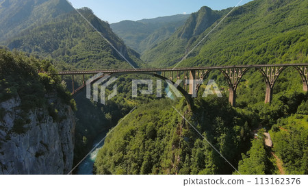 Aerial view on Djurdjevica arch bridge over Tara 113162376