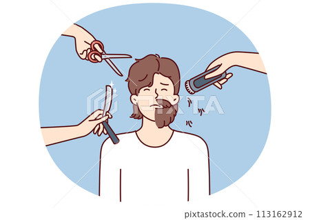 Hands with scissors and shaving devices around man with partially trimmed beard 113162912