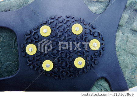 Anti-slip covers with spikes for shoes to reduce of slipping on ice, snow, and slippery surfaces during winter months. 113163969