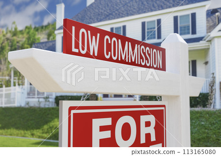 Low Commission For Sale Real Estate Sign In Front Of New House. 113165080