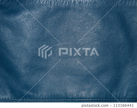 Natural leather dyed in blue with scratches macro photo as background. 113166441