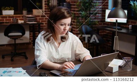 Worker creating marketing project plan on laptop, writing necessary steps, close up shot. Zoom in on office clerk working on strategy research to create financial development for company 113168212
