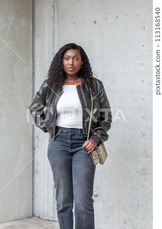 Contemporary Urban Chic: Young African Woman in Trendy Attire Contemporary Urban Chic: Young African Woman in Trendy Attire 113168540