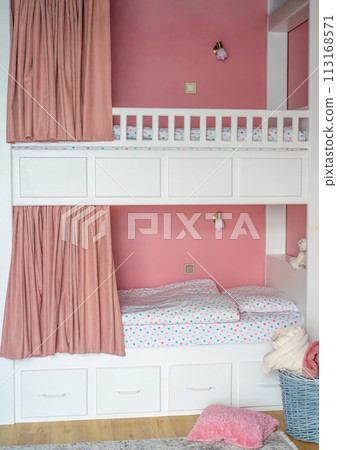 Pink curtains for bunk bed for girls in the bedroom without people 113168571