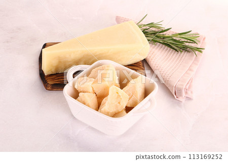 Chopped Italian hard parmesan cheese 113169252
