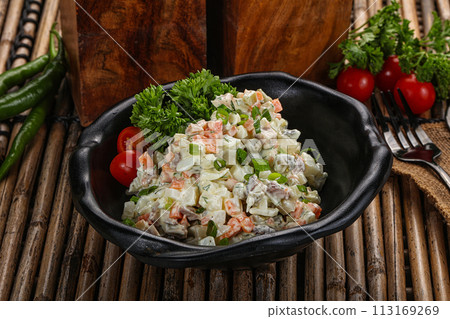 Traditional Russian salad with mayonnaise Traditional Russian salad with mayonnaise 113169269