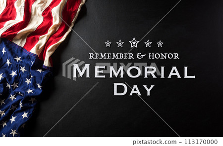 Happy memorial day concept made from american flag with text on black wooden background. Happy memorial day concept made from american flag with text on black wooden background. 113170000