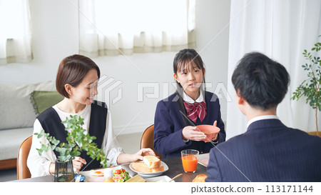 Parent and child talking at the dining table Parent and child talking at the dining table 113171144