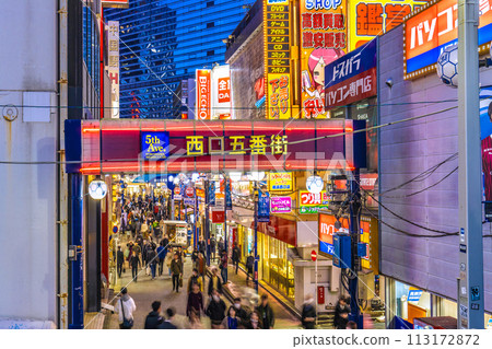 Yokohama, Japan cityscape Friday night. View of West Exit Fifth Avenue in front of Yokohama Station. Many people went to the bar district... = 29th 113172872