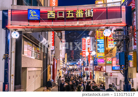 Yokohama, Japan cityscape Friday night. View of West Exit Fifth Avenue in front of Yokohama Station. Many people went to the bar district... = 29th 113175117