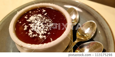 Traditional chocolate dessert in white bowl 113175298