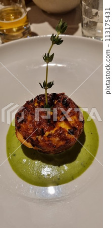 Gourmet grilled meatball with green sauce 113175431
