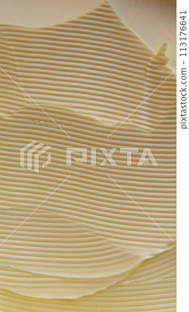 Yellow butter background and texture 113176641