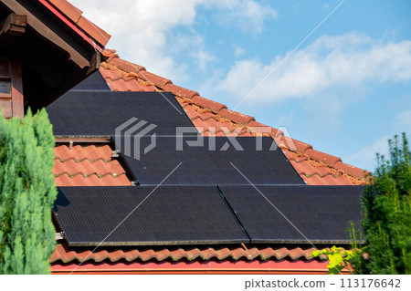 Solar power energy on the roof to a standard house 113176642