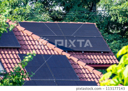 Solar power energy on the roof to a standard house Solar power energy on the roof to a standard house 113177143