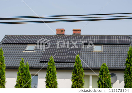 Historic farm house with modern solar panels 113178504
