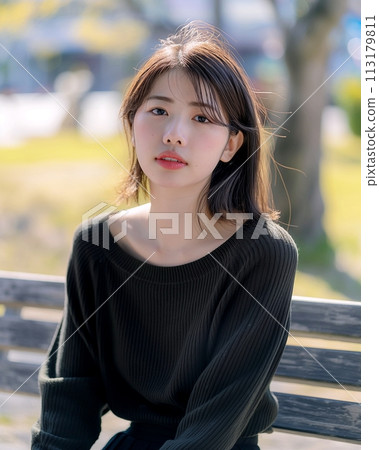 Woman sitting on a park bench "AI generated image" Woman sitting on a park bench "AI generated image" 113179811