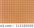 Spelt waffle with a grid pattern as background 113182038