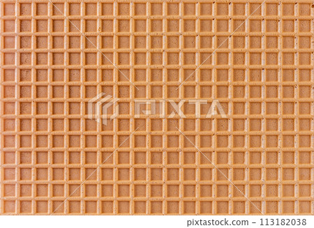 Spelt waffle with a grid pattern as background 113182038
