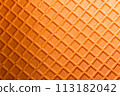 Spelt waffle with a grid pattern as background 113182042