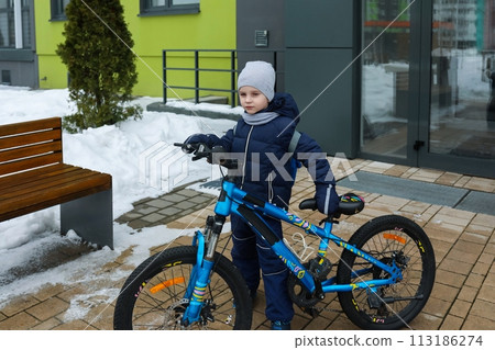 Lifestyle concept, boy with bicycle on the street 113186274