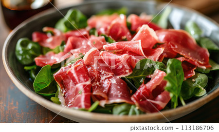 Spinach salad with jamon 113186706
