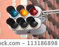 yellow traffic lights in the city 113186898
