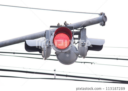 Red flashing traffic light Red flashing traffic light 113187289