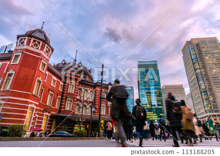 Tokyo cityscape in Japan Tokyo Station Marunouchi North Exit. People heading to the station after finishing work. In the back are office buildings in Marunouchi 113188205