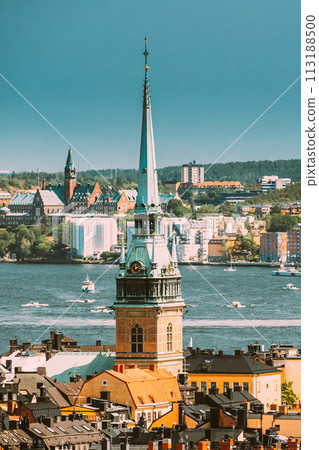 Stockholm, Sweden. Scenic View Of Skyline At Summer Day. Elevated View Of German St Gertrude's Church. Famous Popular Destination Stockholm, Sweden. Scenic View Of Skyline At Summer Day. Elevated View Of German St Gertrude's Church. Famous Popular Destination 113188500